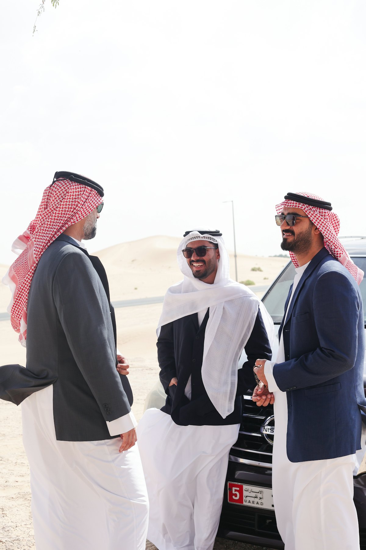 Gulf business professionals talking outside